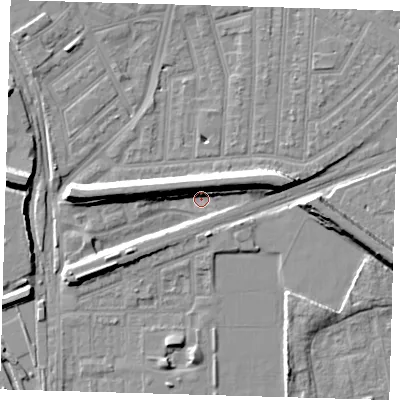 Shaded relief map of the ground around E153AR, computed from Environment Agency LiDAR. The ground here sits at about 0 m above sea level and falls 10 m across the surrounding 800 m. Surface water reaching this point runs off ground lying to the east-north-east, 9.1 m higher.