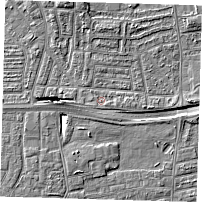 Shaded relief map of the ground around E164EQ, computed from Environment Agency LiDAR. The ground here sits at about 2 m above sea level and falls 11 m across the surrounding 800 m. Surface water reaching this point runs off ground lying to the west, 1.5 m higher.