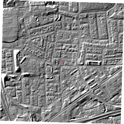 Shaded relief map of the ground around E164QH, computed from Environment Agency LiDAR. The ground here sits at about 0 m above sea level and falls 6 m across the surrounding 800 m. Surface water reaching this point runs off ground lying to the east, 2.9 m higher.