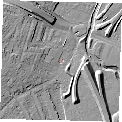 Shaded relief map of the ground around E181FB, computed from Environment Agency LiDAR. The ground here sits at about 12 m above sea level and falls 17 m across the surrounding 800 m. Surface water reaching this point runs off ground lying to the west, 13.3 m higher.