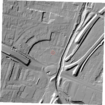 Shaded relief map of the ground around E181HW, computed from Environment Agency LiDAR. The ground here sits at about 12 m above sea level and falls 17 m across the surrounding 800 m. Surface water reaching this point runs off ground lying to the west, 14.4 m higher.