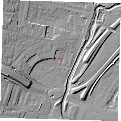 Shaded relief map of the ground around E181HX, computed from Environment Agency LiDAR. The ground here sits at about 12 m above sea level and falls 16 m across the surrounding 800 m. Surface water reaching this point runs off ground lying to the west, 14.4 m higher.