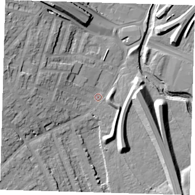 Shaded relief map of the ground around E181NN, computed from Environment Agency LiDAR. The ground here sits at about 12 m above sea level and falls 18 m across the surrounding 800 m. Surface water reaching this point runs off ground lying to the west-south-west, 13.8 m higher.