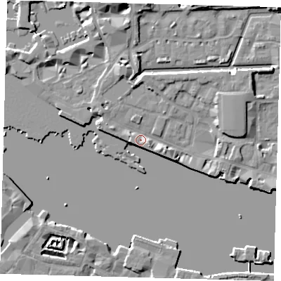 Shaded relief map of the ground around E1W1NJ, computed from Environment Agency LiDAR. The ground here sits at about 5 m above sea level and falls 8 m across the surrounding 800 m. Surface water reaching this point runs off ground lying to the north-north-west, 7.2 m higher.