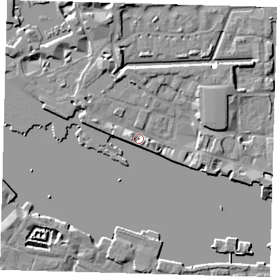 Shaded relief map of the ground around E1W1NQ, computed from Environment Agency LiDAR. The ground here sits at about 5 m above sea level and falls 7 m across the surrounding 800 m. Surface water reaching this point runs off ground lying to the north-north-west, 6.8 m higher.