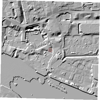 Shaded relief map of the ground around E1W1YJ, computed from Environment Agency LiDAR. The ground here sits at about 5 m above sea level and falls 13 m across the surrounding 800 m. Surface water reaching this point runs off ground lying to the north-north-west, 11.4 m higher.