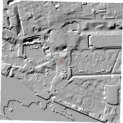 Shaded relief map of the ground around E1W1YY, computed from Environment Agency LiDAR. The ground here sits at about 6 m above sea level and falls 13 m across the surrounding 800 m. Surface water reaching this point runs off ground lying to the north-north-west, 1.5 m higher.
