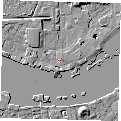Shaded relief map of the ground around E1W2AN, computed from Environment Agency LiDAR. The ground here sits at about 5 m above sea level and falls 22 m across the surrounding 800 m. Surface water reaching this point runs off ground lying to the east-south-east, 0.8 m higher.