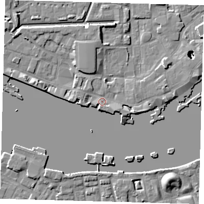 Shaded relief map of the ground around E1W2NN, computed from Environment Agency LiDAR. The ground here sits at about 5 m above sea level and falls 22 m across the surrounding 800 m. Surface water reaching this point runs off ground lying to the south-east, 4.2 m higher.