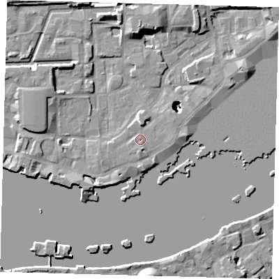 Shaded relief map of the ground around E1W2NT, computed from Environment Agency LiDAR. The ground here sits at about 4 m above sea level and falls 21 m across the surrounding 800 m. Surface water reaching this point runs off ground lying to the north, 2.4 m higher.