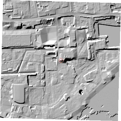 Shaded relief map of the ground around E1W3AQ, computed from Environment Agency LiDAR. The ground here sits at about 6 m above sea level and falls 26 m across the surrounding 800 m. Surface water reaching this point runs off ground lying to the east-north-east, 4.5 m higher.