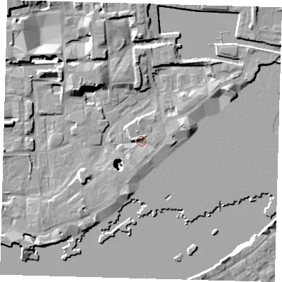 Shaded relief map of the ground around E1W3NG, computed from Environment Agency LiDAR. The ground here sits at about 4 m above sea level and falls 23 m across the surrounding 800 m. Surface water reaching this point runs off ground lying to the west-north-west, 2.4 m higher.