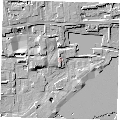 Shaded relief map of the ground around E1W3RQ, computed from Environment Agency LiDAR. The ground here sits at about 7 m above sea level and falls 26 m across the surrounding 800 m. Surface water reaching this point runs off ground lying to the west, 1.1 m higher.