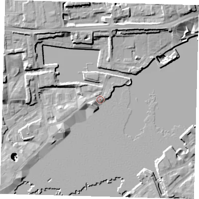 Shaded relief map of the ground around E1W3SL, computed from Environment Agency LiDAR. The ground here sits at about 4 m above sea level and falls 26 m across the surrounding 800 m. Surface water reaching this point runs off ground lying to the west-south-west, 4.4 m higher.