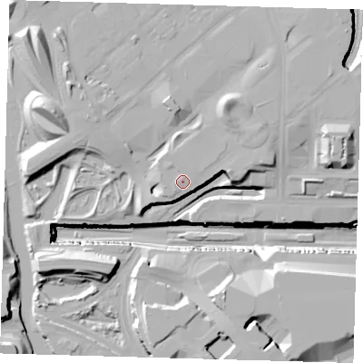 Shaded relief map of the ground around E201JY, computed from Environment Agency LiDAR. The ground here sits at about 12 m above sea level and falls 29 m across the surrounding 800 m. Surface water reaching this point runs off ground lying to the east-north-east, 2.0 m higher.