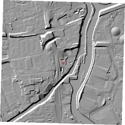Shaded relief map of the ground around E33JW, computed from Environment Agency LiDAR. The ground here sits at about 7 m above sea level and falls 12 m across the surrounding 800 m. Surface water reaching this point runs off ground lying to the north-north-west, 9.3 m higher.