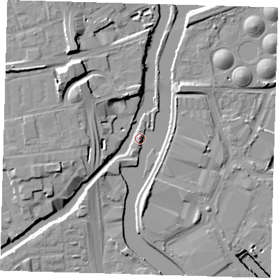 Shaded relief map of the ground around E33JY, computed from Environment Agency LiDAR. The ground here sits at about 5 m above sea level and falls 15 m across the surrounding 800 m. Surface water reaching this point runs off ground lying to the north-west, 9.4 m higher.
