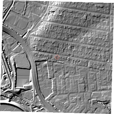 Shaded relief map of the ground around E48QG, computed from Environment Agency LiDAR. The ground here sits at about 12 m above sea level and falls 9 m across the surrounding 800 m. Surface water reaching this point runs off ground lying to the north-west, 2.6 m higher.