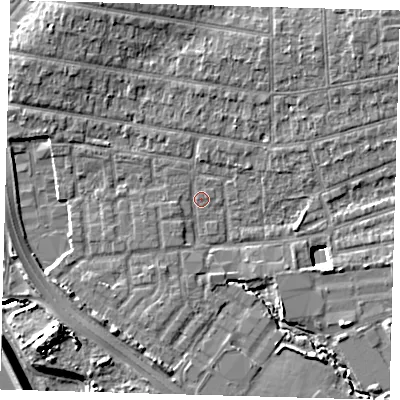 Shaded relief map of the ground around E48QS, computed from Environment Agency LiDAR. The ground here sits at about 12 m above sea level and falls 11 m across the surrounding 800 m. Surface water reaching this point runs off ground lying to the east-south-east, 6.6 m higher.