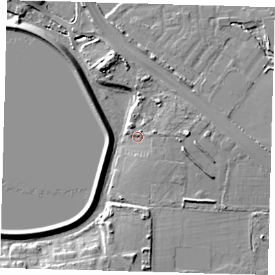 Shaded relief map of the ground around E48TX, computed from Environment Agency LiDAR. The ground here sits at about 12 m above sea level and falls 11 m across the surrounding 800 m. Surface water reaching this point runs off ground lying to the east, 3.8 m higher.