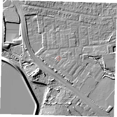 Shaded relief map of the ground around E48YL, computed from Environment Agency LiDAR. The ground here sits at about 12 m above sea level and falls 11 m across the surrounding 800 m. Surface water reaching this point runs off ground lying to the south, 3.0 m higher.