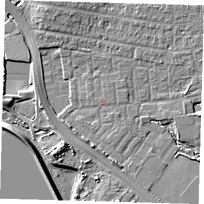 Shaded relief map of the ground around E48YW, computed from Environment Agency LiDAR. The ground here sits at about 12 m above sea level and falls 11 m across the surrounding 800 m. Surface water reaching this point runs off ground lying to the south, 3.2 m higher.