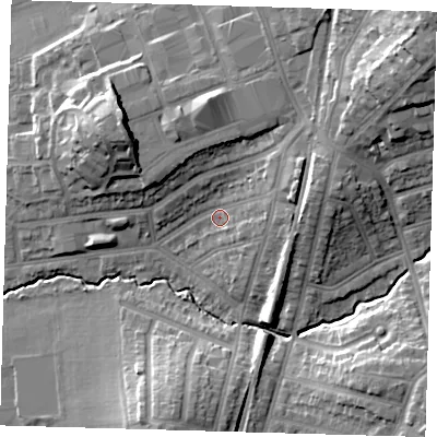 Shaded relief map of the ground around E49NQ, computed from Environment Agency LiDAR. The ground here sits at about 21 m above sea level and falls 25 m across the surrounding 800 m. Surface water reaching this point runs off ground lying to the north-east, 18.7 m higher.