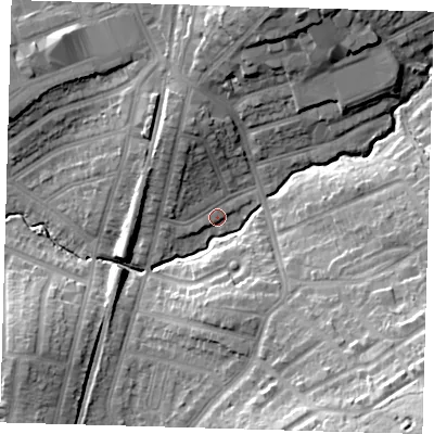 Shaded relief map of the ground around E49PS, computed from Environment Agency LiDAR. The ground here sits at about 21 m above sea level and falls 30 m across the surrounding 800 m. Surface water reaching this point runs off ground lying to the south-east, 26.9 m higher.