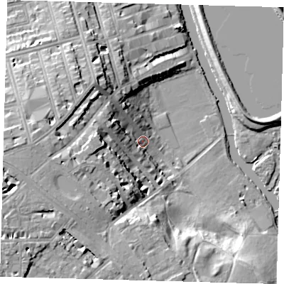 Shaded relief map of the ground around E59BN, computed from Environment Agency LiDAR. The ground here sits at about 12 m above sea level and falls 27 m across the surrounding 800 m. Surface water reaching this point runs off ground lying to the west-north-west, 13.2 m higher.