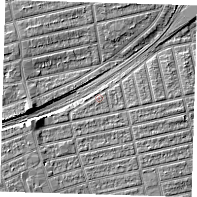 Shaded relief map of the ground around E62AA, computed from Environment Agency LiDAR. The ground here sits at about 7 m above sea level and falls 8 m across the surrounding 800 m. Surface water reaching this point runs off ground lying to the west-south-west, 1.0 m higher.