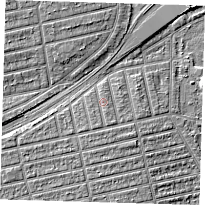 Shaded relief map of the ground around E62AQ, computed from Environment Agency LiDAR. The ground here sits at about 6 m above sea level and falls 8 m across the surrounding 800 m. Surface water reaching this point runs off ground lying to the south-south-west, 1.4 m higher.