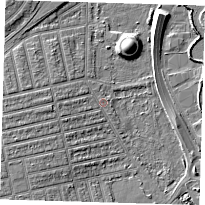 Shaded relief map of the ground around E62EU, computed from Environment Agency LiDAR. The ground here sits at about 4 m above sea level and falls 11 m across the surrounding 800 m. Surface water reaching this point runs off ground lying to the west, 4.2 m higher.