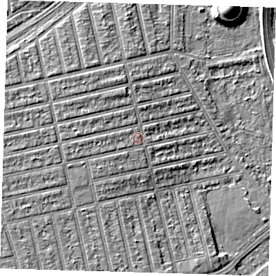 Shaded relief map of the ground around E62EY, computed from Environment Agency LiDAR. The ground here sits at about 6 m above sea level and falls 11 m across the surrounding 800 m. Surface water reaching this point runs off ground lying to the west, 2.2 m higher.