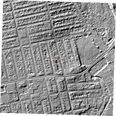 Shaded relief map of the ground around E62NP, computed from Environment Agency LiDAR. The ground here sits at about 5 m above sea level and falls 6 m across the surrounding 800 m. Surface water reaching this point runs off ground lying to the south, 1.6 m higher.