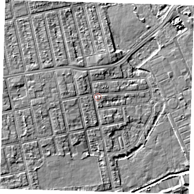 Shaded relief map of the ground around E62PZ, computed from Environment Agency LiDAR. The ground here sits at about 4 m above sea level and falls 6 m across the surrounding 800 m. Surface water reaching this point runs off ground lying to the west, 2.2 m higher.