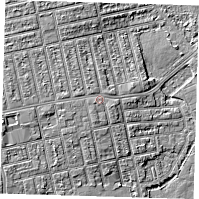Shaded relief map of the ground around E62SA, computed from Environment Agency LiDAR. The ground here sits at about 6 m above sea level and falls 6 m across the surrounding 800 m. Surface water reaching this point runs off ground lying to the west, 1.4 m higher.