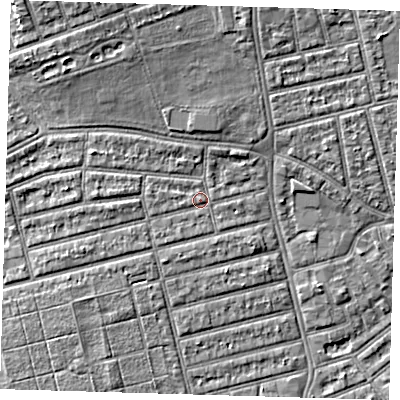 Shaded relief map of the ground around E63LU, computed from Environment Agency LiDAR. The ground here sits at about 4 m above sea level and falls 6 m across the surrounding 800 m. Surface water reaching this point runs off ground lying to the west, 1.8 m higher.