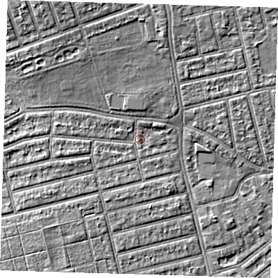Shaded relief map of the ground around E63LX, computed from Environment Agency LiDAR. The ground here sits at about 4 m above sea level and falls 7 m across the surrounding 800 m. Surface water reaching this point runs off ground lying to the west, 2.2 m higher.