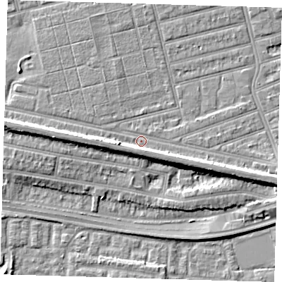 Shaded relief map of the ground around E63PN, computed from Environment Agency LiDAR. The ground here sits at about 4 m above sea level and falls 9 m across the surrounding 800 m. Surface water reaching this point runs off ground lying to the west, 5.4 m higher.