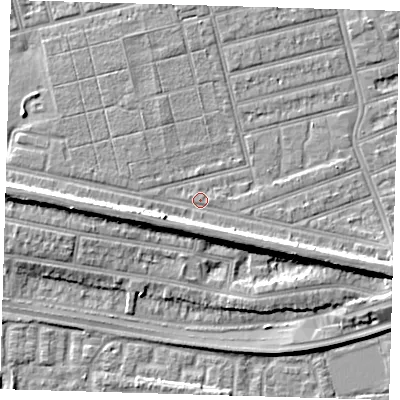 Shaded relief map of the ground around E63PZ, computed from Environment Agency LiDAR. The ground here sits at about 4 m above sea level and falls 9 m across the surrounding 800 m. Surface water reaching this point runs off ground lying to the west-south-west, 5.4 m higher.