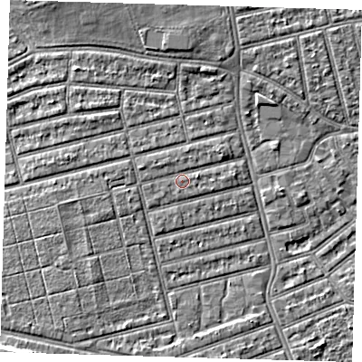 Shaded relief map of the ground around E63QG, computed from Environment Agency LiDAR. The ground here sits at about 4 m above sea level and falls 7 m across the surrounding 800 m. Surface water reaching this point runs off ground lying to the west-north-west, 1.2 m higher.