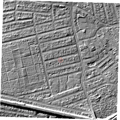 Shaded relief map of the ground around E63QP, computed from Environment Agency LiDAR. The ground here sits at about 4 m above sea level and falls 8 m across the surrounding 800 m. Surface water reaching this point runs off ground lying to the west, 1.1 m higher.