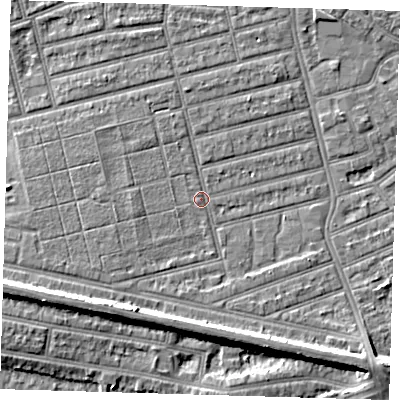 Shaded relief map of the ground around E63QS, computed from Environment Agency LiDAR. The ground here sits at about 4 m above sea level and falls 8 m across the surrounding 800 m. Surface water reaching this point runs off ground lying to the north-north-west, 1.1 m higher.