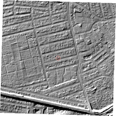 Shaded relief map of the ground around E63QT, computed from Environment Agency LiDAR. The ground here sits at about 4 m above sea level and falls 8 m across the surrounding 800 m. Surface water reaching this point runs off ground lying to the west, 1.0 m higher.