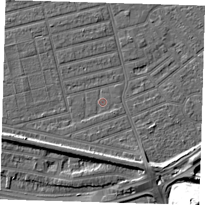 Shaded relief map of the ground around E63QZ, computed from Environment Agency LiDAR. The ground here sits at about 4 m above sea level and falls 33 m across the surrounding 800 m. Surface water reaching this point runs off ground lying to the south-south-west, 1.2 m higher.