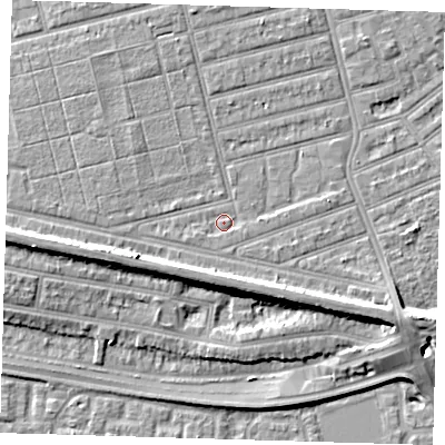 Shaded relief map of the ground around E63RD, computed from Environment Agency LiDAR. The ground here sits at about 4 m above sea level and falls 10 m across the surrounding 800 m. Surface water reaching this point runs off ground lying to the west-south-west, 1.1 m higher.