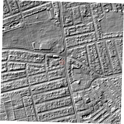 Shaded relief map of the ground around E63RN, computed from Environment Agency LiDAR. The ground here sits at about 4 m above sea level and falls 7 m across the surrounding 800 m. Surface water reaching this point runs off ground lying to the west, 2.3 m higher.