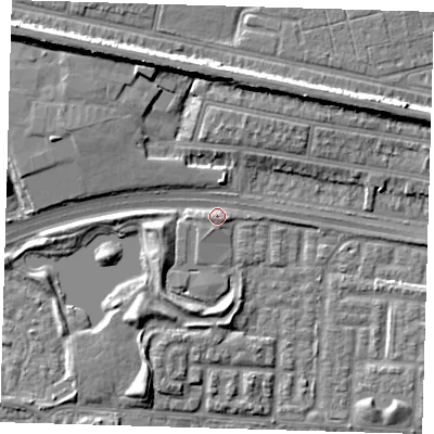 Shaded relief map of the ground around E65AE, computed from Environment Agency LiDAR. The ground here sits at about 2 m above sea level and falls 9 m across the surrounding 800 m. Surface water reaching this point runs off ground lying to the west-south-west, 1.8 m higher.