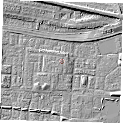 Shaded relief map of the ground around E65JU, computed from Environment Agency LiDAR. The ground here sits at about 3 m above sea level and falls 8 m across the surrounding 800 m. Surface water reaching this point runs off ground lying to the north-north-east, 0.6 m higher.