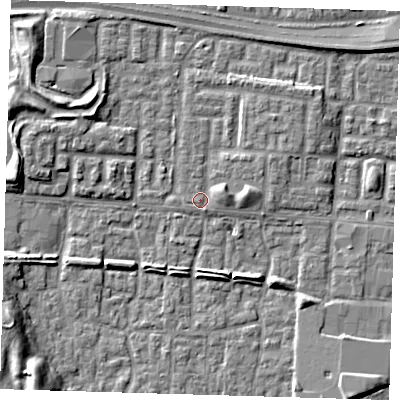 Shaded relief map of the ground around E65JY, computed from Environment Agency LiDAR. The ground here sits at about 2 m above sea level and falls 9 m across the surrounding 800 m. Surface water reaching this point runs off ground lying to the east, 2.7 m higher.